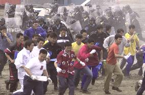 Osaka police stage antihooligan World Cup soccer drills